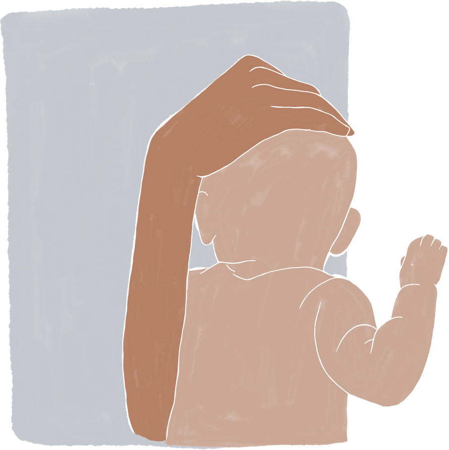 baby holding 2 square